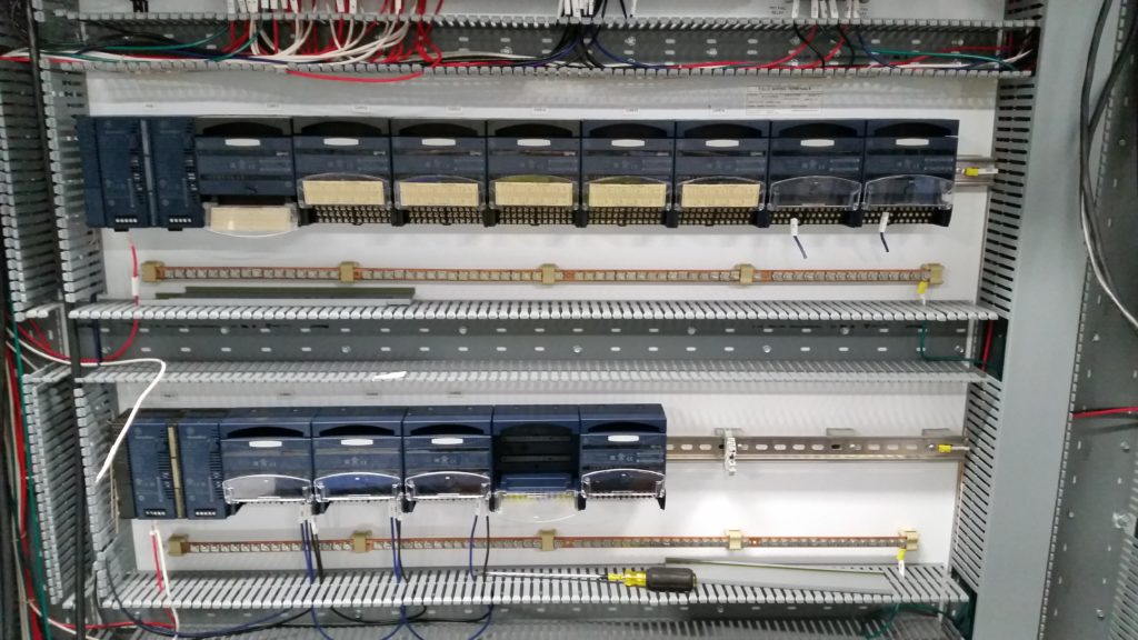 PLC I/O cabinet with panel wiring chopped and cards moved